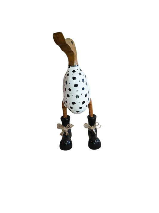 A Duck Wooden Stone Rock With Black Boots